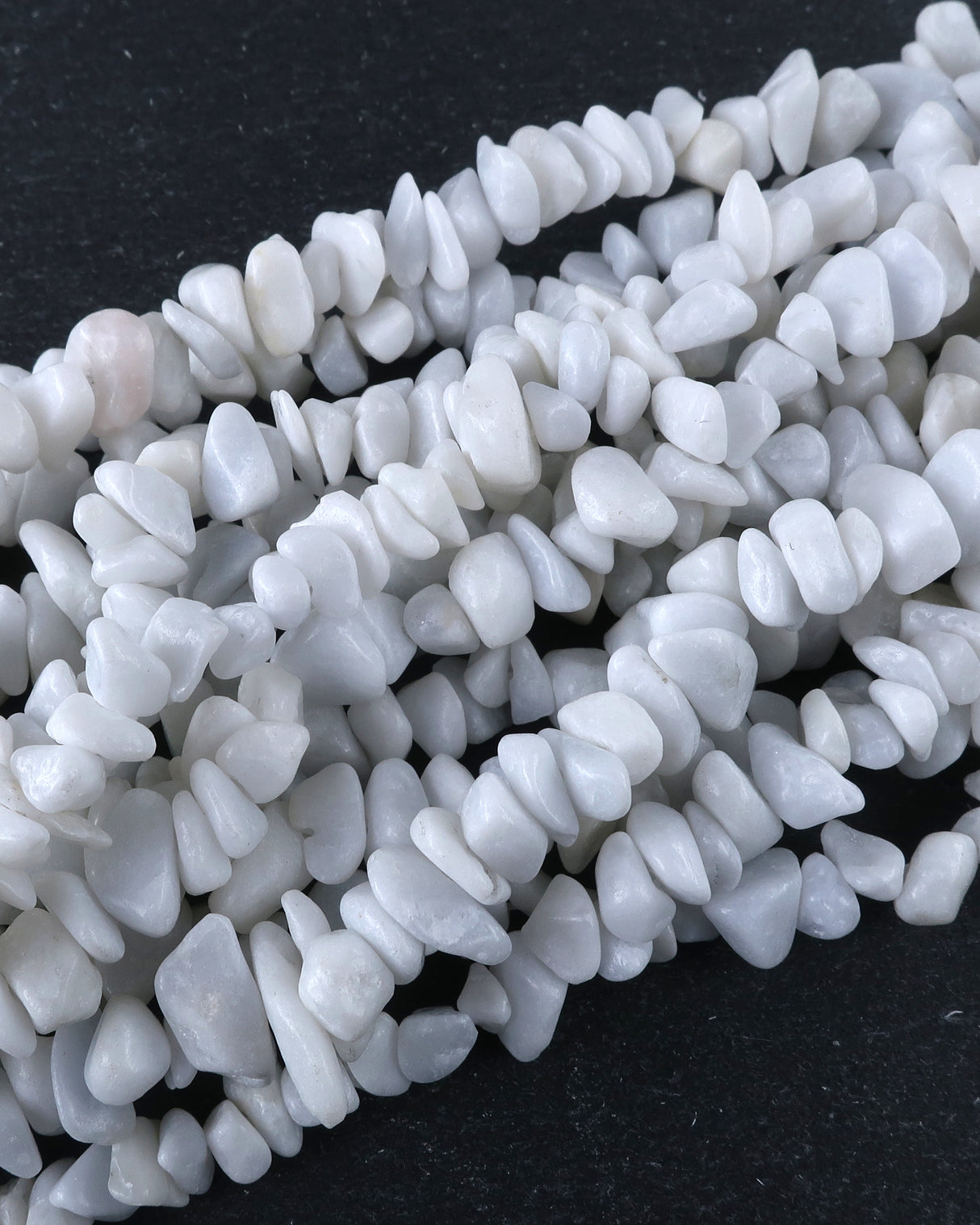 Medium White Feldspar Chip Beads · 30" strand