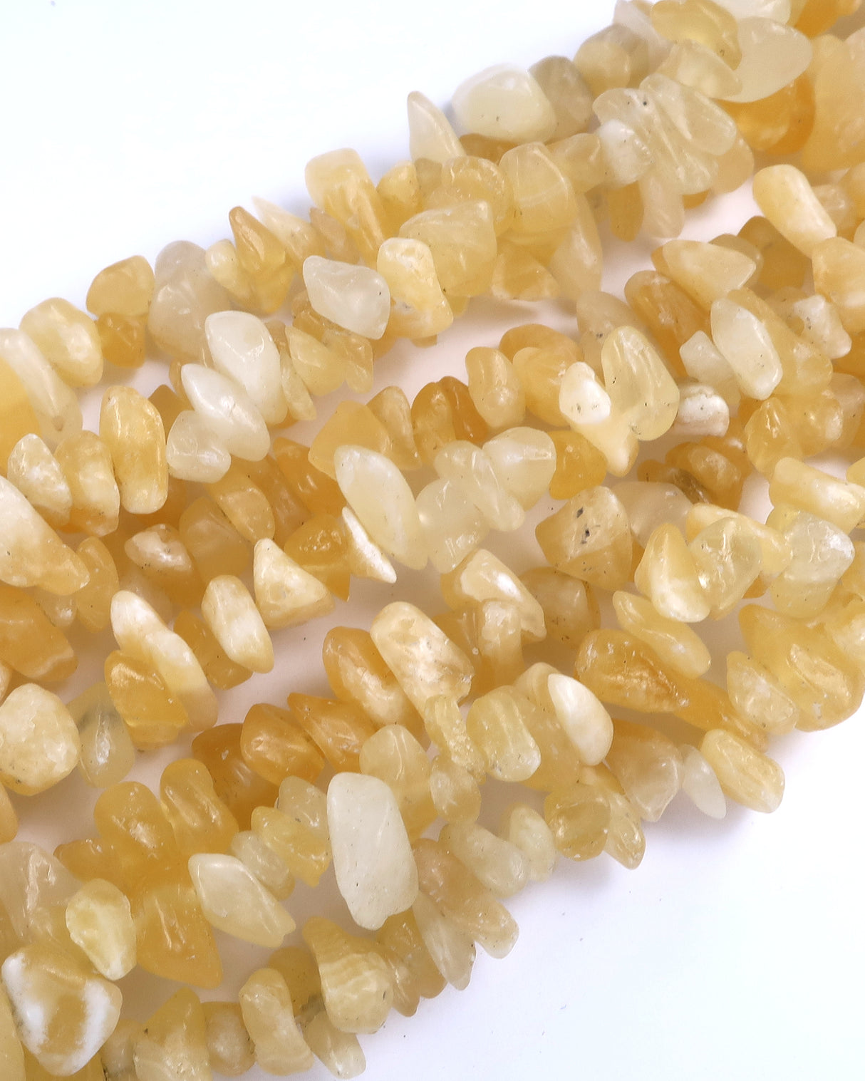 Medium Calcite Chip Beads · 30" strand