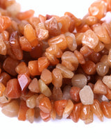 Medium Red Aventurine Chip Beads · 30" strand