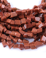 Medium Goldstone Chip Beads · 30" strand