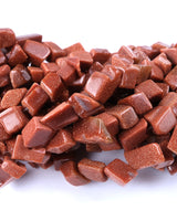 Medium Goldstone Chip Beads · 30" strand