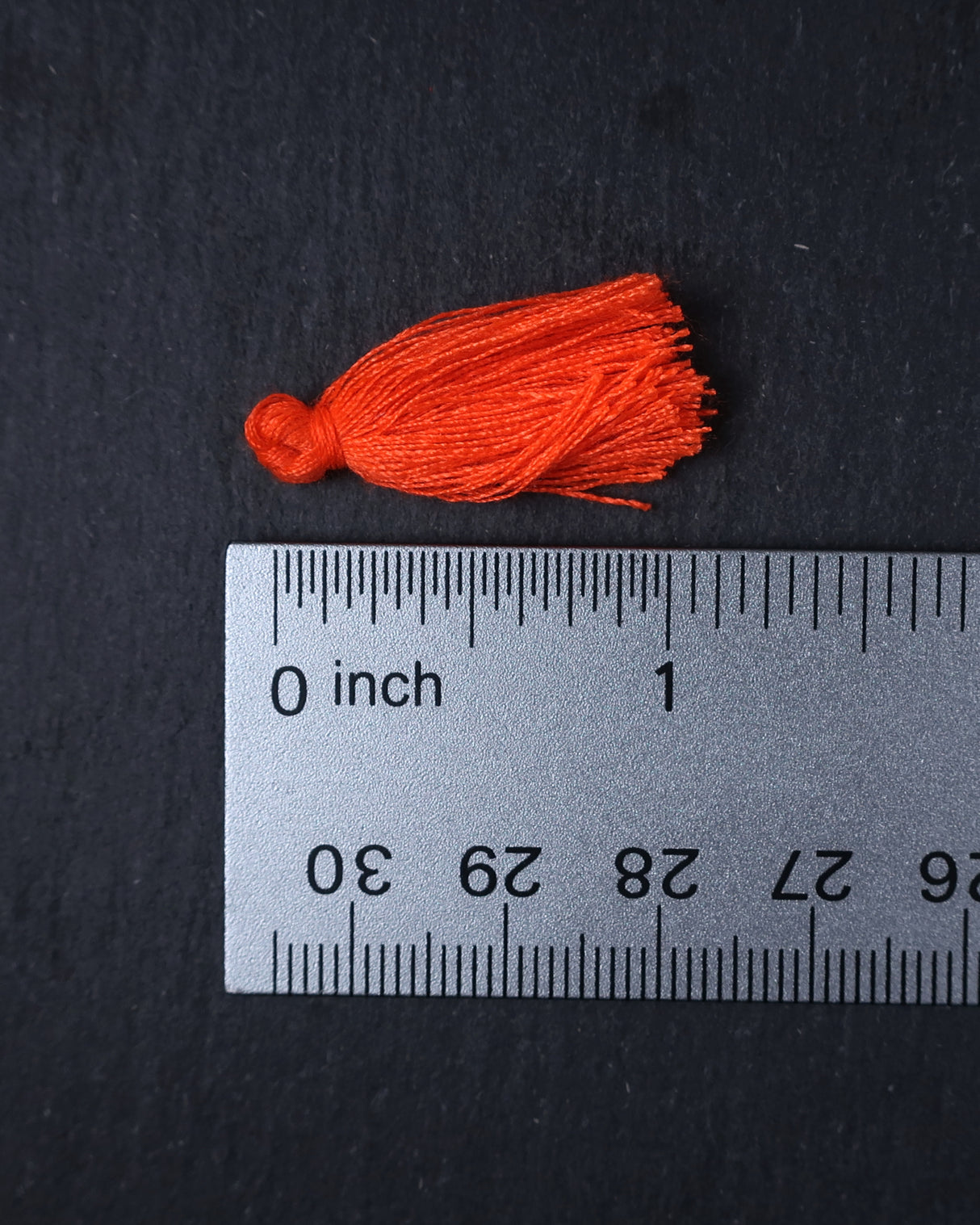 Mini Neon Orange Tassels · 10 pack