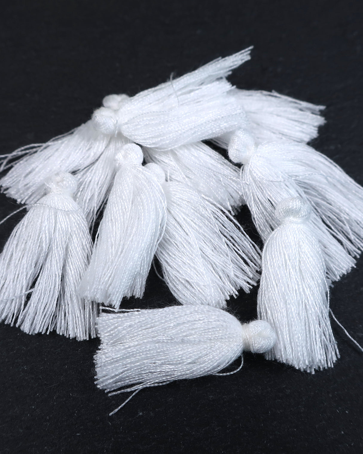 Mini White Tassels • 10 pack